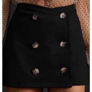 Anthropologie Trench black high waisted mini skirt button front detail Medium